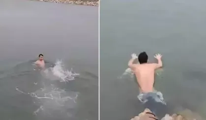 Buz gibi havaya aldırmadan denize girip, yüzdü